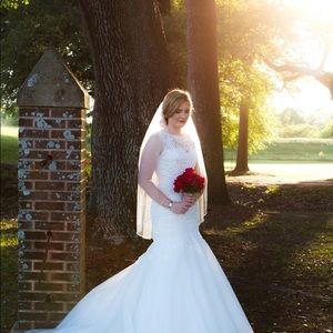 Selling my Wedding dress. Lillian West. Size 10. Comes with veil.